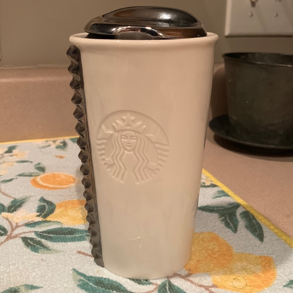 Starbucks cup. It’s ceramic.